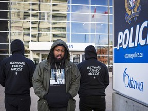 Rapper City Fidelia, seen here outside of the Ottawa Police Service's Elgin Street police headquarters, is releasing a new song called Drugs and Loaded Weapons that illustrates the tension between young Black men and the police.