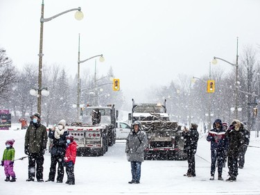 Crews were working with explosive charges and various other equipment to blast and break up ice on the Rideau River, Saturday Feb. 27, 2021. The city undertakes ice breaking operations near the Rideau Falls to alleviate possible spring flooding in flood-prone areas. People came out to watch the process.