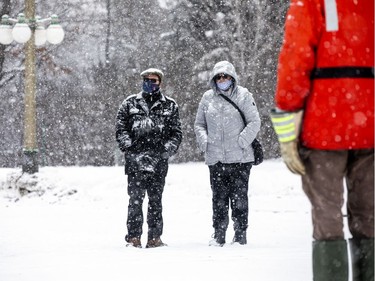 Crews were working with explosive charges and various other equipment to blast and break up ice on the Rideau River, Saturday Feb. 27, 2021. The city undertakes ice breaking operations near the Rideau Falls to alleviate possible spring flooding in flood-prone areas. People came out to watch the process.