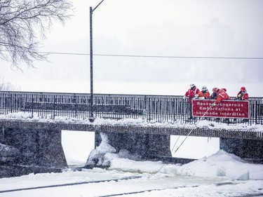 Crews were working with explosive charges and various other equipment to blast and break up ice on the Rideau River, Saturday Feb. 27, 2021. The city undertakes ice breaking operations near the Rideau Falls to alleviate possible spring flooding in flood-prone areas. People came out to watch the process.