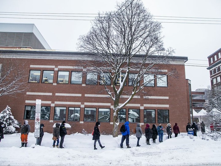  Eligible vaccine recipients, mostly frontline workers, lined up outside The Ottawa Hospital Civic Campus, Saturday Feb. 27, 2021, in the snowstorm that hit the capital, to receive their much anticipated COVID-19 vaccine.