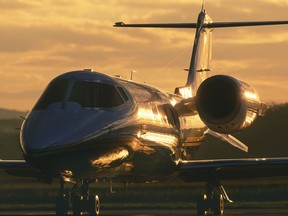 Bombardier Learjet 31A parked at dusk.
