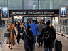 People queue to enter Terminal 2 at Heathrow Airport as tighter rules for international travellers start amid the COVID-19 pandemic, London, Britain, January 18, 2021.