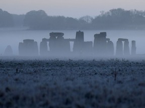 FILE PHOTO: Stonehenge ancient stone circle is seen at dawn, near Amesbury, Wiltshire, Britain, November 4, 2020.