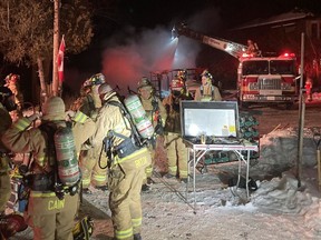 Ottawa firefighters at a fire in McLaren's Landing Thursday night.