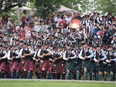 Hundreds of pipers and drummers perform together at the Glengarry Highland Games in August 2019 in Maxville.