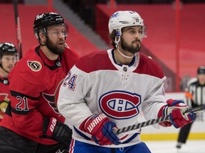 file photo/ Ottawa Senators center Derek Stepan (left) and Montreal Canadiens center Phillip Danault  follow the puck in the first period at the Canadian Tire Centre, Feb. 6, 2021.