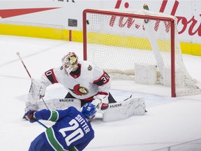Canucks forward Brandon Sutter scores with a shot past Senators goaltender Matt Murray in a game at Vancouver on Jan. 25.