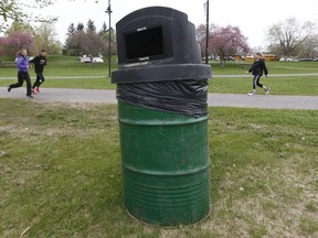 A 2018 file photo of a garbage can at Mooney's Bay Park. That park is already part of a pilot project seeking to increase the amount of recycled material and to reduce the amount of waste left in city parks.