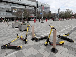 OTTAWA - Electric scooters left on the ground at Lansdowne Park in Ottawa Tuesday Sept 1, 2020.