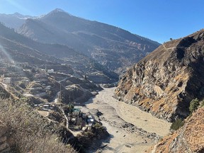 This general view shows state-run NTPC hydropower project site damaged after a broken glacier caused a major river surge that swept away bridges and roads, near Joshimath in Chamoli district of Uttarakhand, on February 7, 2021.