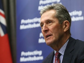 Premier Brian Pallister speaks during a press conference in Winnipeg.