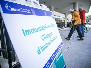 Eligible candidates for the vaccine enter the COVID-19 Immunization Clinic at the Nepean Sportsplex on Sunday, March 14, 2021.