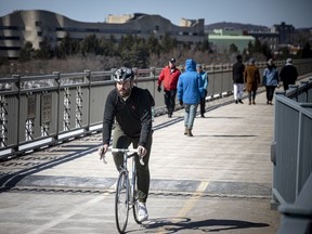 Paths, sidewalks and, in this case, the Alexandra Bridge were filled with Ottawans out and about on Saturday.