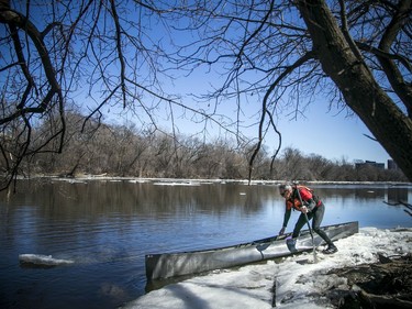 Pierre Lavictoire launched his canoe on the Rideau River, Sunday, March 21, 2021.