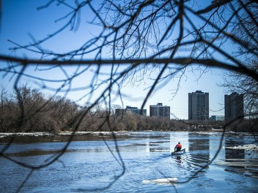 Pierre Lavictoire launched his canoe and went for a paddle in the Rideau River near Clegg Ave. on the first weekend of spring, Sunday, March 21, 2021.