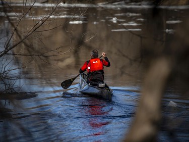Pierre Lavictoire launched his canoe and went for a paddle in the Rideau River near Clegg Ave. on the first weekend of spring, Sunday, March 21, 2021.