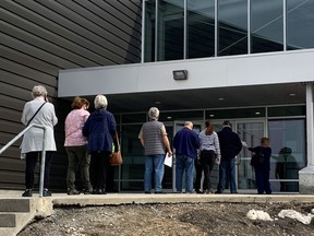 People wait to get vaccinated at the Ruddy Family YMCA-YWCA in Orléans on Tuesday, March 23, 2021.