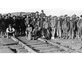 A group of Chinese railroad track workers, circa 1900. Chinese migrant worker were brought to Canada to build the Canadian Pacific Railway. Decades of discriminatory policies followed.