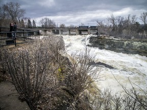 OTTAWA -- March 27, 2021 -- The heavy rain Friday brought water levels up a little making the Hog's Back Falls a beautiful spot to check out Saturday, March 27, 2021. People were out taking pictures and taking in the falls as Ottawa had a cloudy, rather dreary day.
