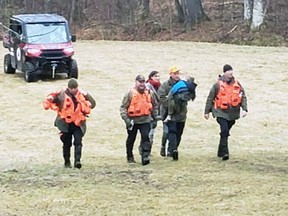 Jude Walter Leyton, 3, is returned to his family on Wednesday after spending three and a half days lost in the woods of South Frontenac.