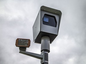 Photo radar and signage on Smyth Road.
