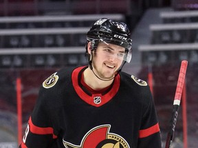 Drake Batherson of the Ottawa Senators smiles after scoring his second goal of the game against the Calgary Flames at Canadian Tire Centre on March 1, 2021 in Ottawa, Ontario, Canada.