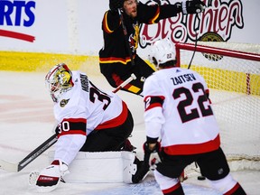 Brett Ritchie of the Calgary Flames celebrates after scoring against Matt Murray of the Ottawa Senators on Thursday.