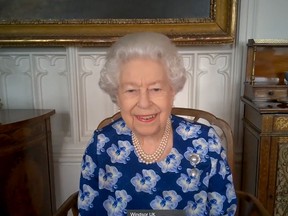 Queen Elizabeth speaks on a video call to thank volunteers with the Royal Voluntary Service in Windsor, England. Meanwhile, she and the Royal Family are working to improve inclusiveness.