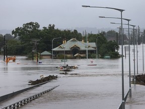 The Windsor Bridge is seen submerged under rising floodwaters along the Hawkesbury River on March 22, 2021 in Sydney, Australia. Evacuation warnings are in place for parts of Western Sydney as floodwaters continue to rise.