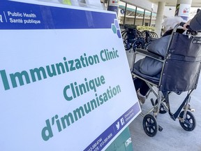 Ottawa residents 80 and older arrive at the Nepean Sportsplex for their appointments to receive the COVID-19 vaccine on Monday, March 15, 2021.