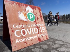 File: Ottawa residents leave the COVID-19 CHEO assessment centre and kids come first care clinic at Brewer Park Arena