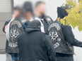 Members of the Estevan chapter of the Heretics MC with members and prospect member of the Hells Angels MC.