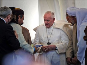 Pope Francis speaks with Iraqi religious figures during an interfaith service at the House of Abraham in the ancient city of Ur in southern Iraq's Dhi Qar province, on March 6, 2021.