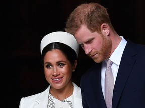 Britain's Prince Harry, Duke of Sussex (right) and Meghan, Duchess of Sussex.