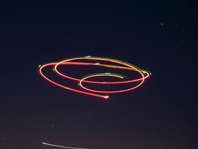 FILE: A (terrestrial) drone is caught in a long-exposure photo.