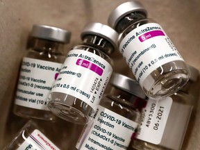 FILE: Empty vials of AstraZeneca COVID-19 vaccine.