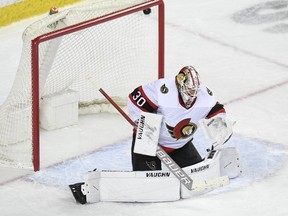 Ottawa Senators goalie Matt Murray is scored on by forward Sean Monahan (not pictured) during the first period at Scotiabank Saddledome, on Thursday.