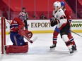 Canadiens goalie Carey Price makes a save in front of Senators forward Brady Tkachuk during the first period of Tuesday's game.