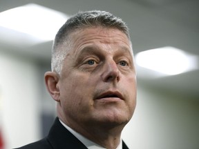 Vice-Admiral Haydn Edmundson speaks to reporters after a change of command ceremony in Ottawa on Thursday, Aug. 22, 2019.