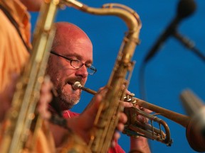 Ottawa-07/21/03-Trumpeter Clyde Forsberg joins Rob Frayne and band in concert at the Ottawa international Jazz Festival.