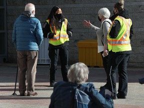 File: Seniors waiting to get their their COVID-19 vaccinations.  TONY CALDWELL, Postmedia.