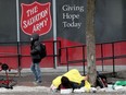 FILE: A homeless man is seen on George Street in Ottawa.