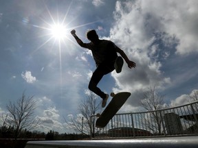 Alex Stefanidis skateboards in the sunshine at Lansdowne Park.