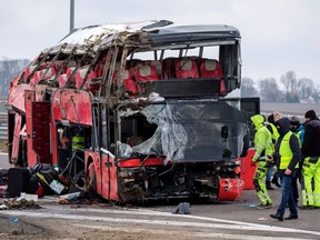 Emergency personnel work at a site of a Ukrainian bus crash on the side of A4 highway from Jaroslaw to Korczowa, near Koszyce, Poland  March 6, 2021.