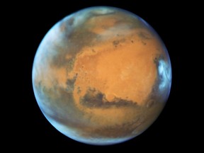 FILE PHOTO: The planet Mars is shown in this NASA Hubble Space Telescope view taken May 12, 2016 when it was 50 million miles from Earth.