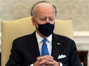 U.S. President Joe Biden attends a bipartisan meeting on cancer legislation in the Oval Office at the White House on March 3, 2021.