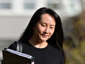 Huawei Technologies Chief Financial Officer Meng Wanzhou leaves her home to attend a court hearing in Vancouver, British Columbia, Canada March 22, 2021.