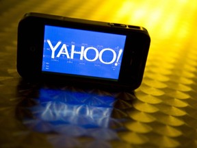 This file photo illustration taken on September 12, 2013 shows the Yahoo logo, seen on a smartphone.