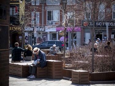 People enjoyed the warm sunshine in the ByWard Market on Saturday. The city removed multiple tables and chairs this past week after the area was heavily crowded a week ago, but people still sat and relaxed in the structures that were in place.